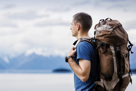 Image Showing A Solo Male Traveller Starring Something.