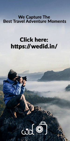 An Professional Photographer Capturing The Beautiful View During An Adventure Travel.