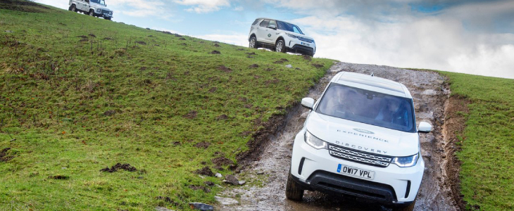 Offroad Jeep Compass In The Mountain Downhill.